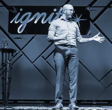 Carlos Whittaker on stage at Ignite 2020